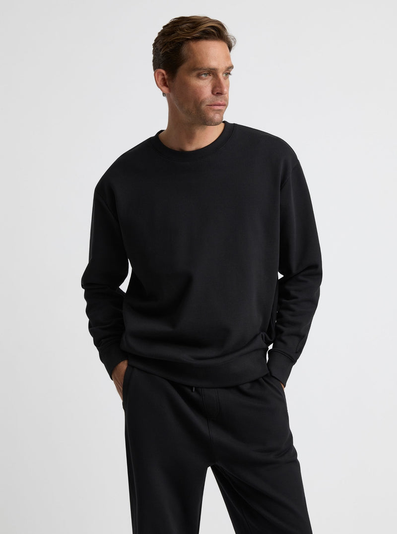 Black|Good Earth Cotton® Sweatshirts – Sustainable Cotton Sweatshirts|Broed is 6’1” and wearing a size L