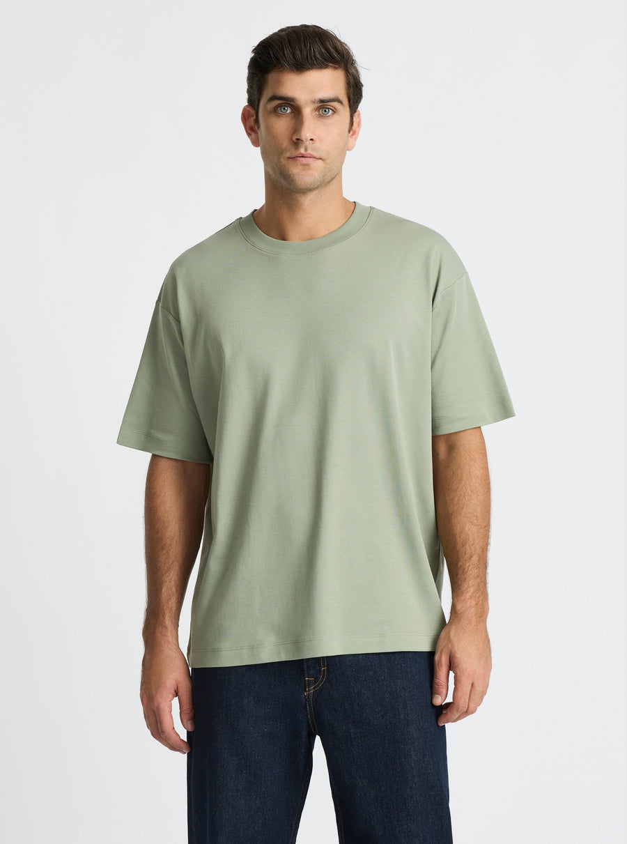 Dessert Sage|Good Earth Cotton® Oversized Tee – Sustainable Cotton T-shirt|Jack is 6’2” and wearing a size L