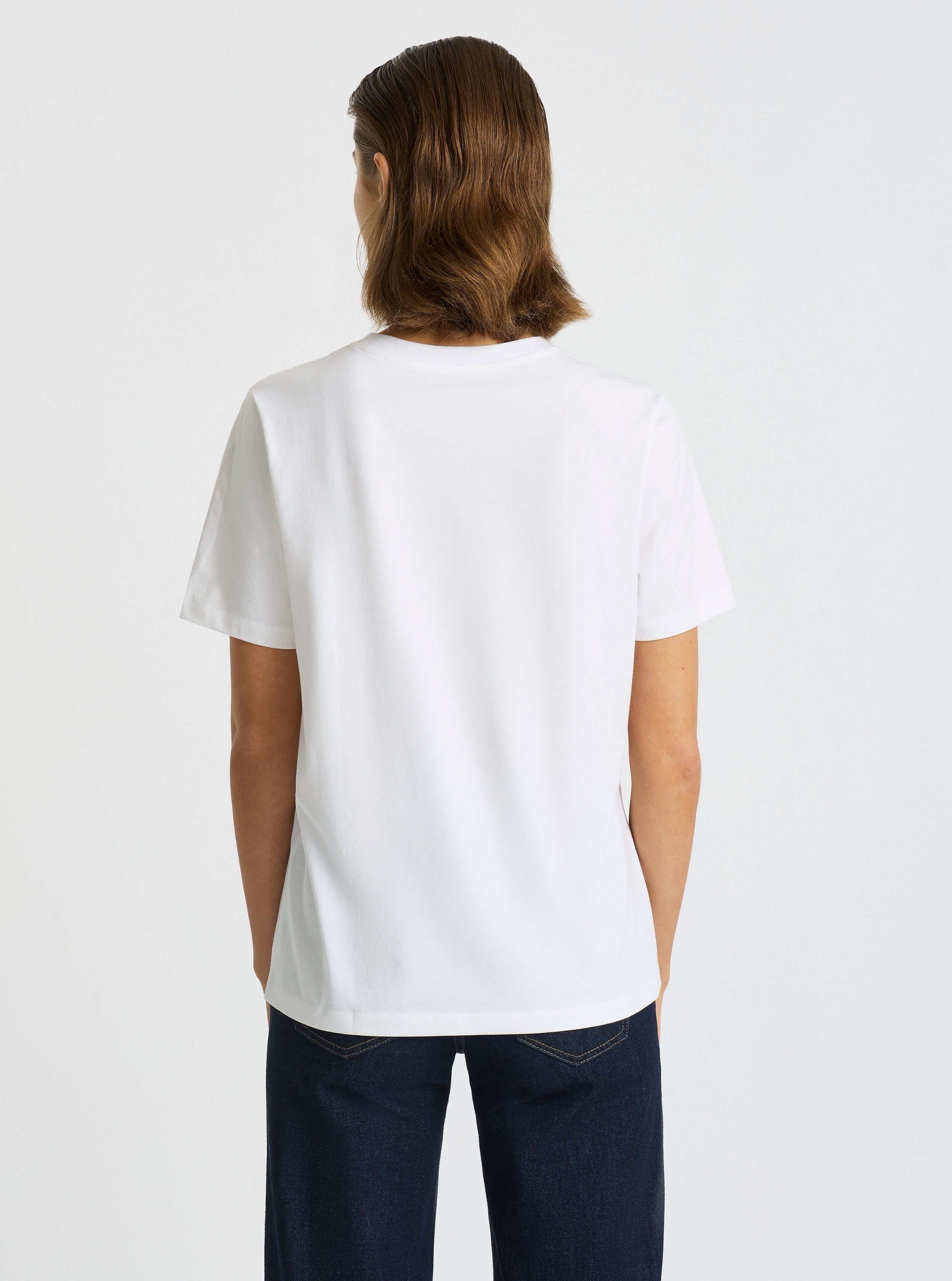 White|Stas is 5'10" and wearing a size S