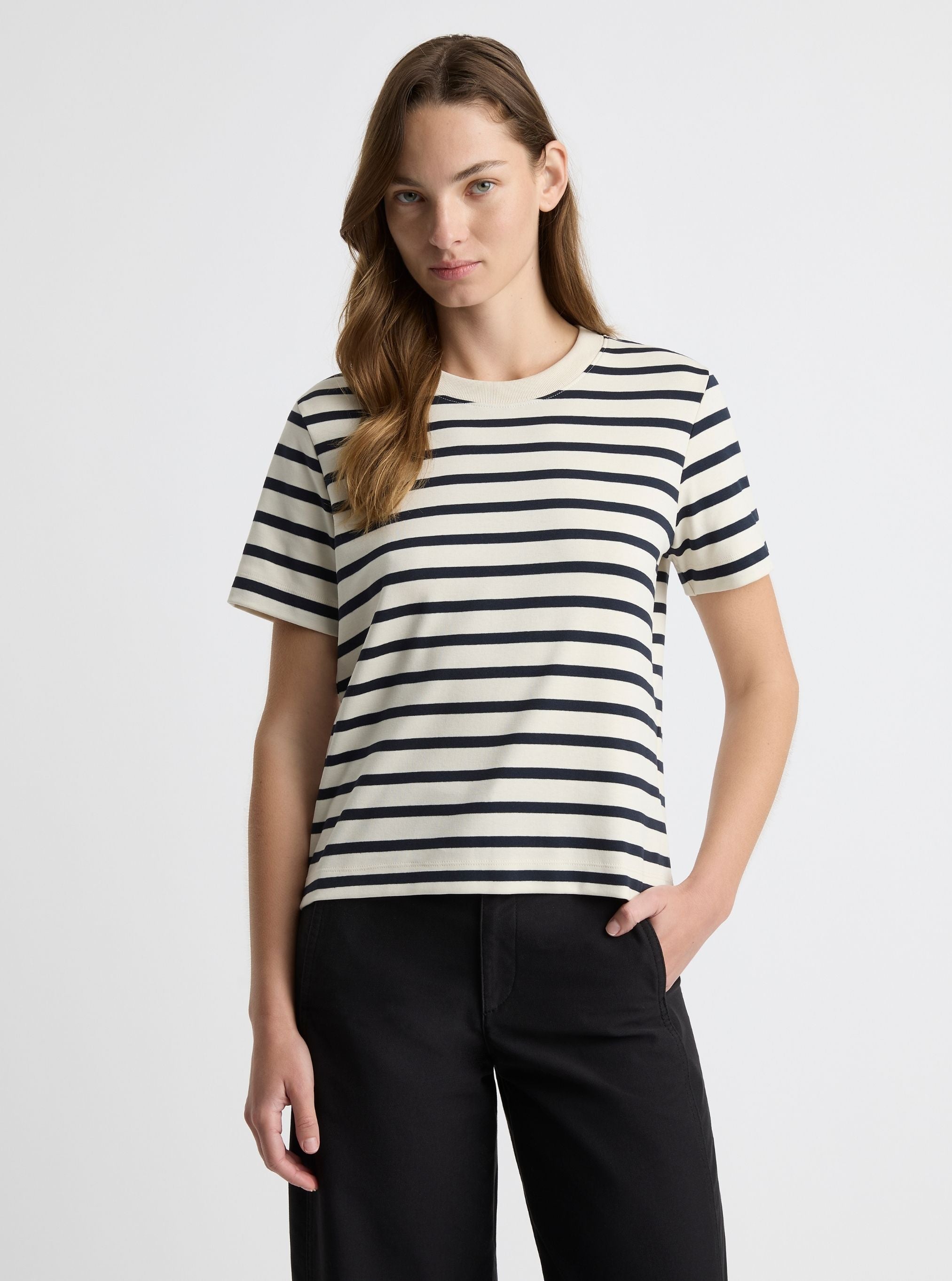 Stripe White/Navy|Black and white striped t-shirt on a light gray background|Zenya is 5'10" and wearing a size S