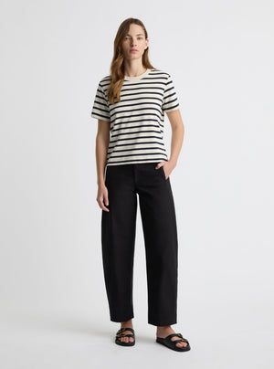 Stripe White/Navy|Black and white striped t-shirt on a light gray background|Zenya is 5'10" and wearing a size S