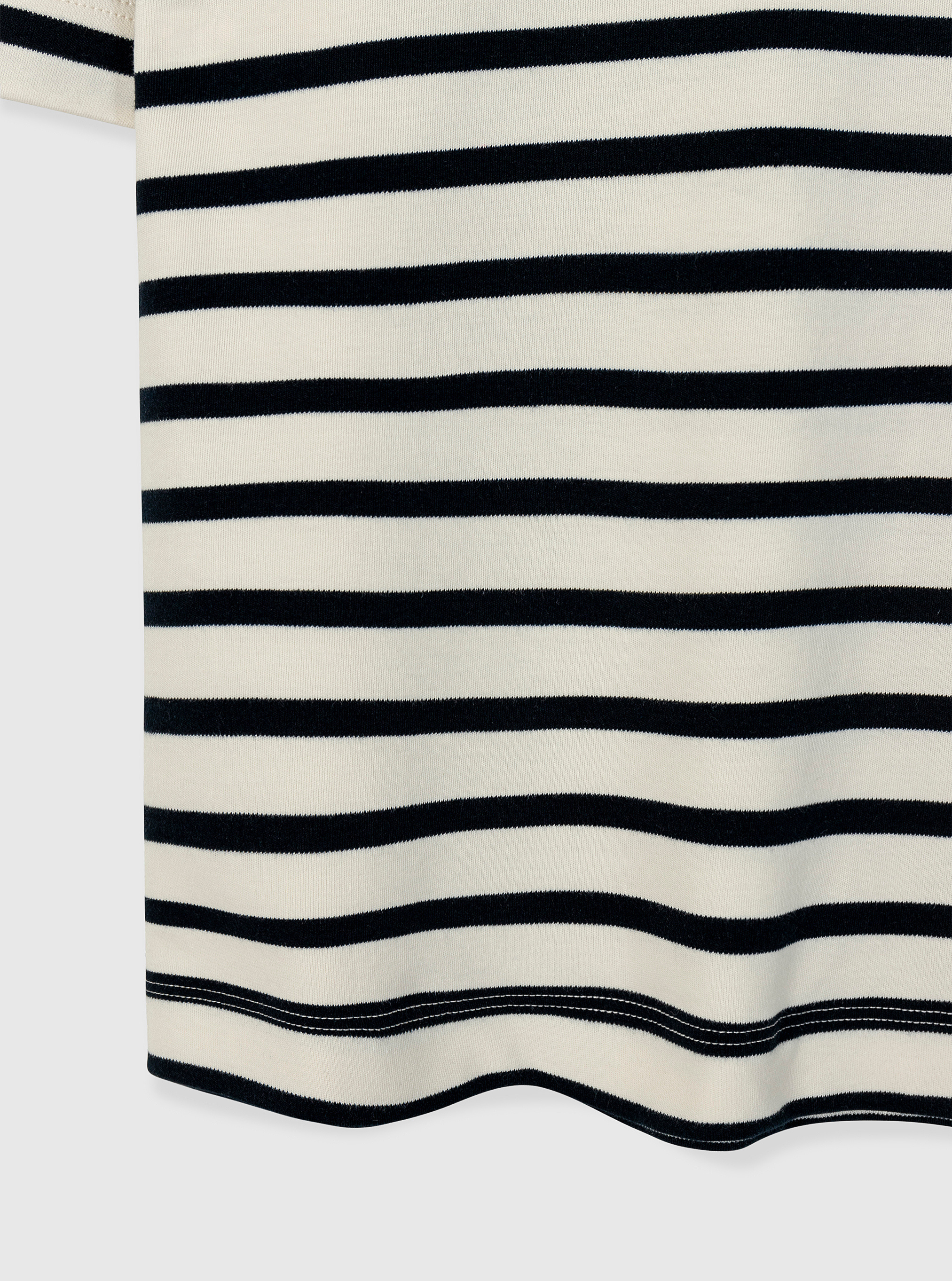 Stripe White/Navy|Black and white striped t-shirt on a light gray background|Stripe White/Navy