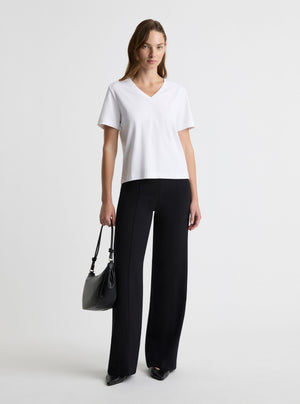White|Zenya is 5'10" and wearing a size S