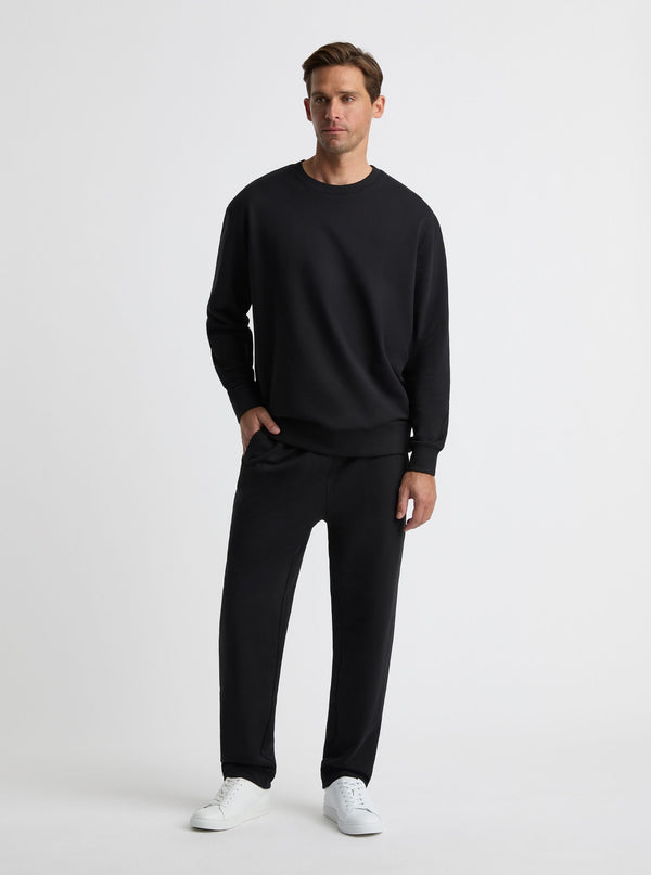 Black|Good Earth Cotton® Sweatshirts – Sustainable Cotton Sweatshirts|Broed is 6’1” and wearing a size L