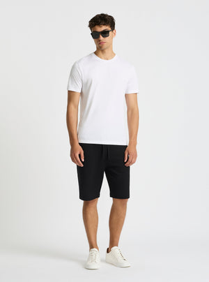 Black|Evans is 6’2” and wearing a size M