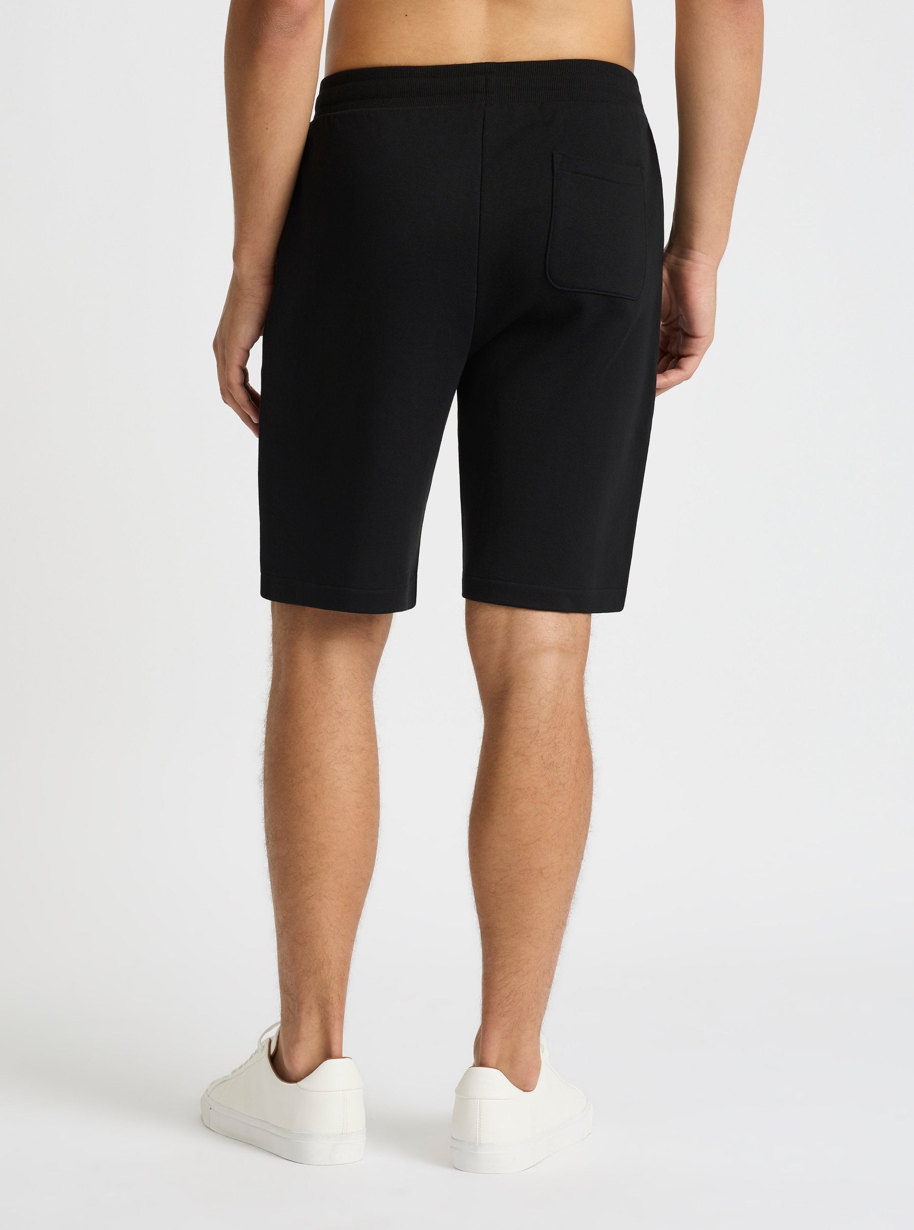 Black|Evans is 6’2” and wearing a size M