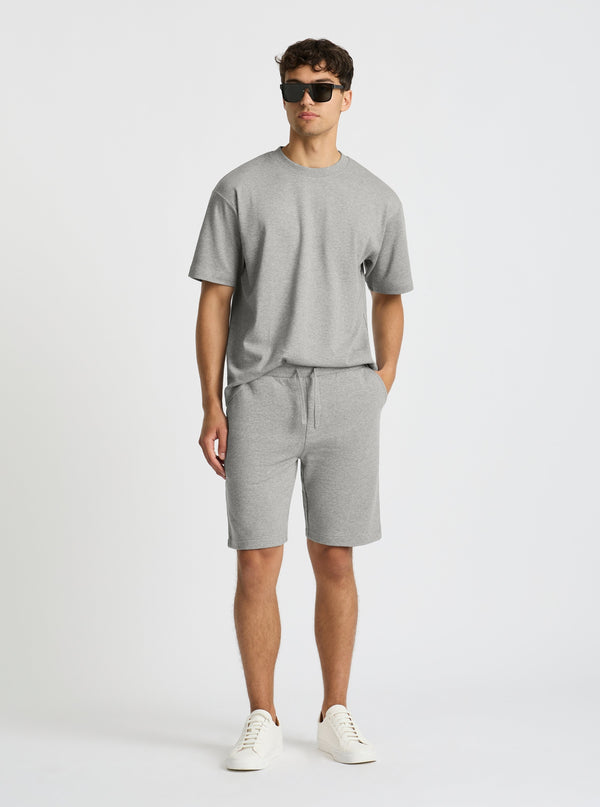 Grey Marl|Evans is 6’2” and wearing a size M