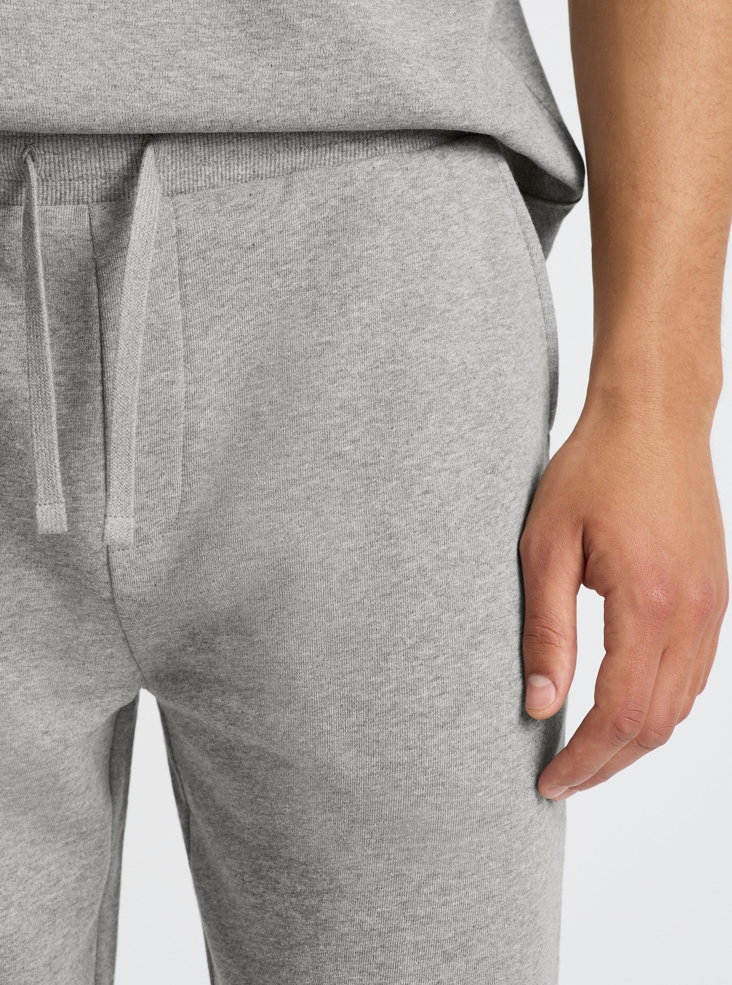 Grey Marl|Evans is 6’2” and wearing a size M