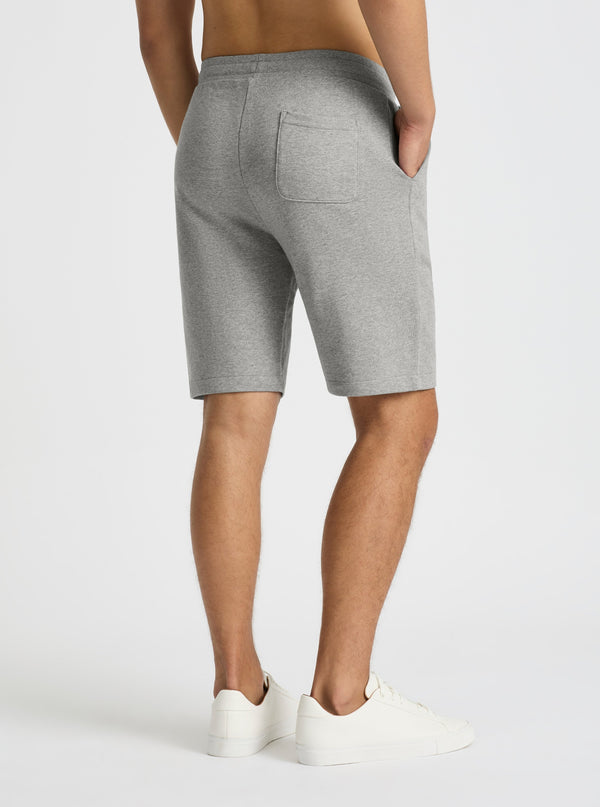 Grey Marl|Evans is 6’2” and wearing a size M