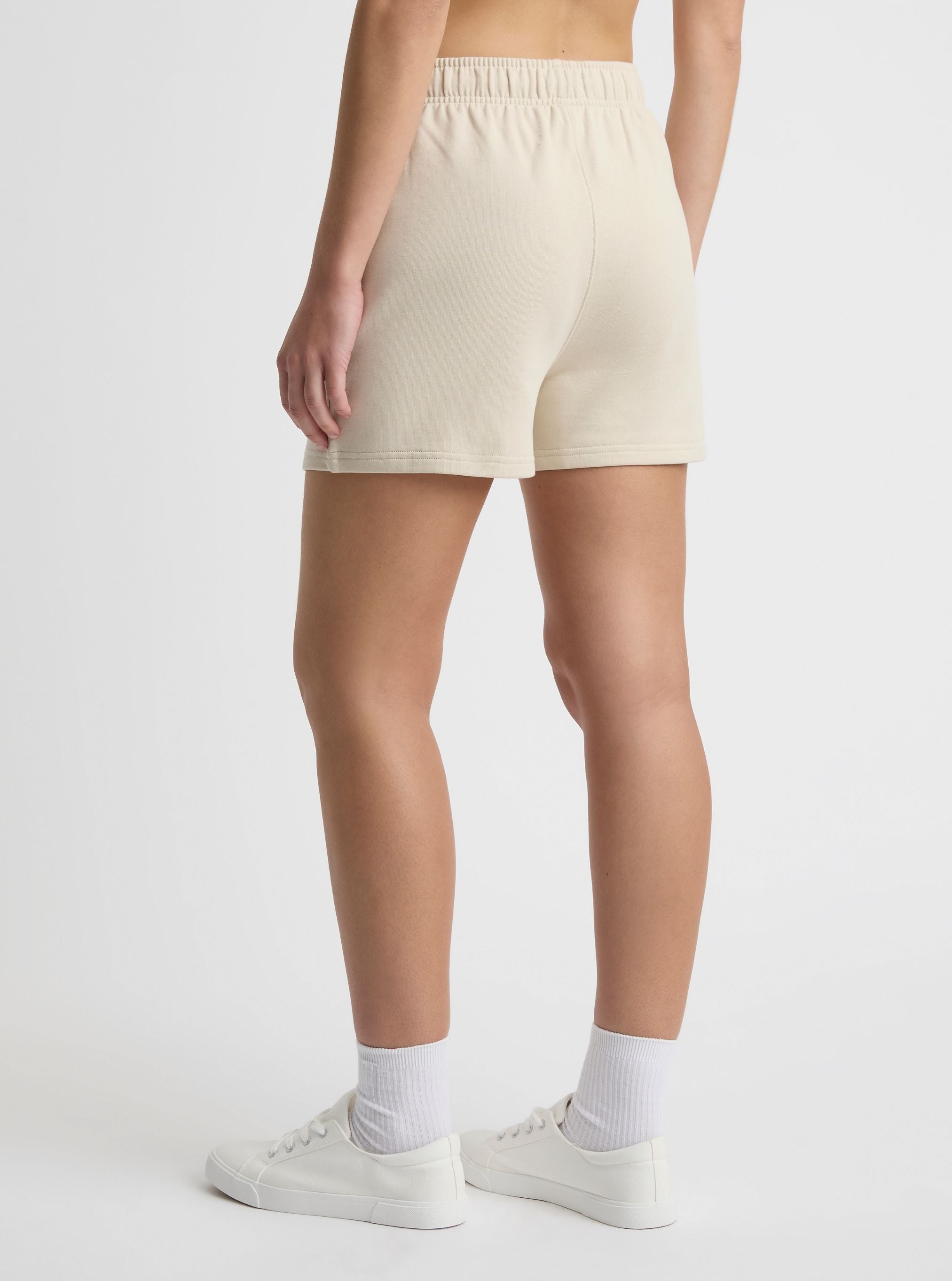 Ecru|Zenya is 5'10" and wearing a size S