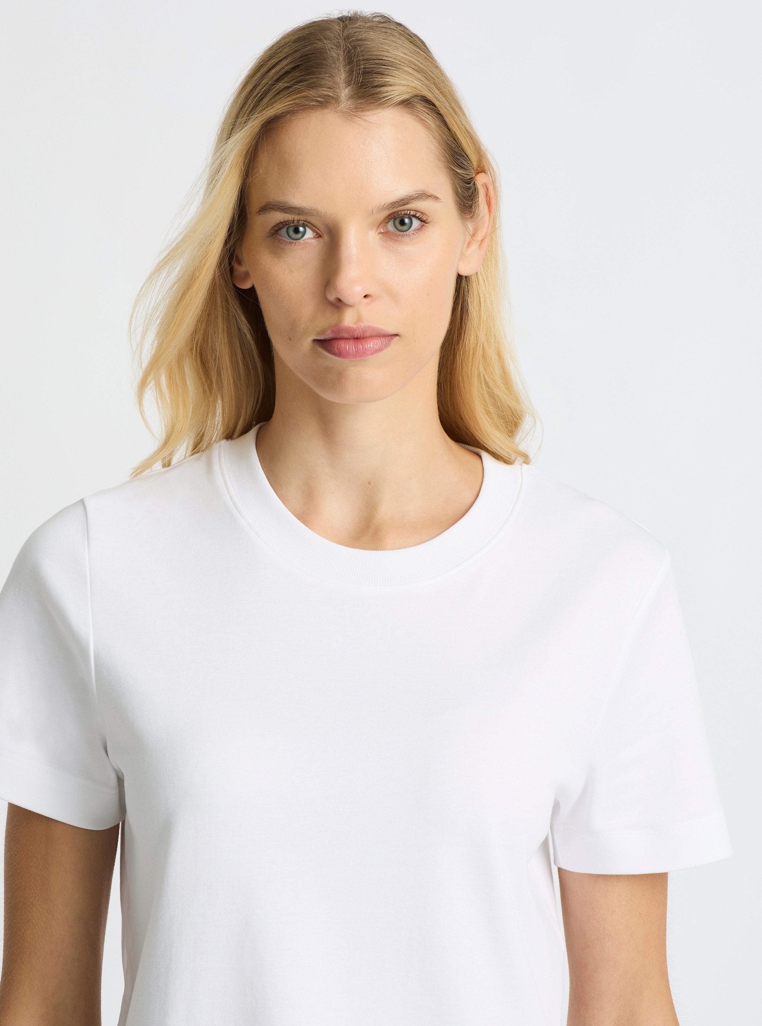 White|Good Earth Cotton® Box Cut Tee – Sustainable Cotton T-shirt|Karolina is 5'10" and wearing a size S