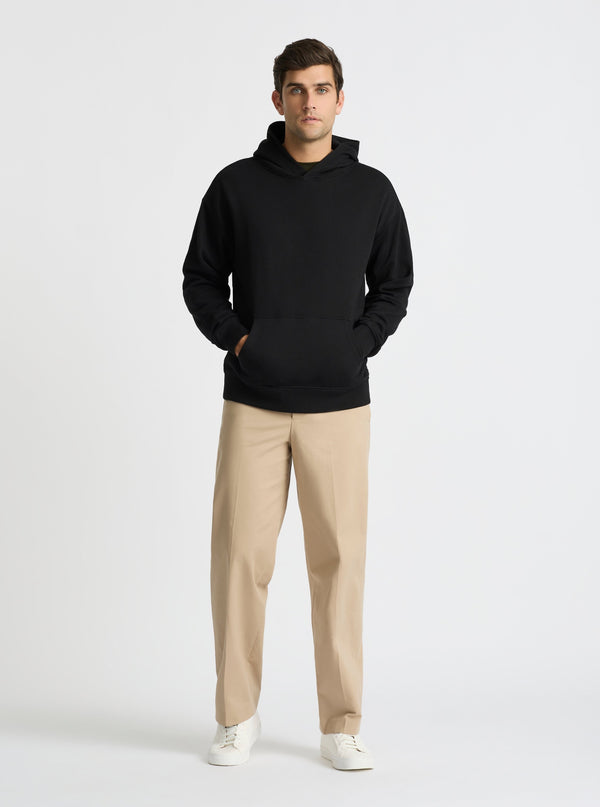Black|Good Earth Cotton® Hoodie for men – Sustainable Cotton Hoodie|Jack is 6’2” and wearing a size L