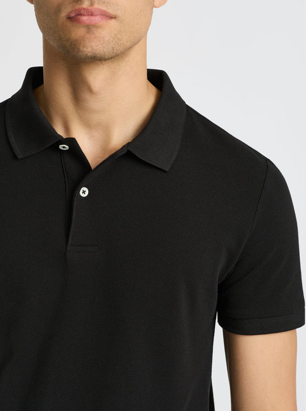 Black|Good Earth Cotton® Polo – Sustainable Cotton Polo|Evans is 6’2” and wearing a size M