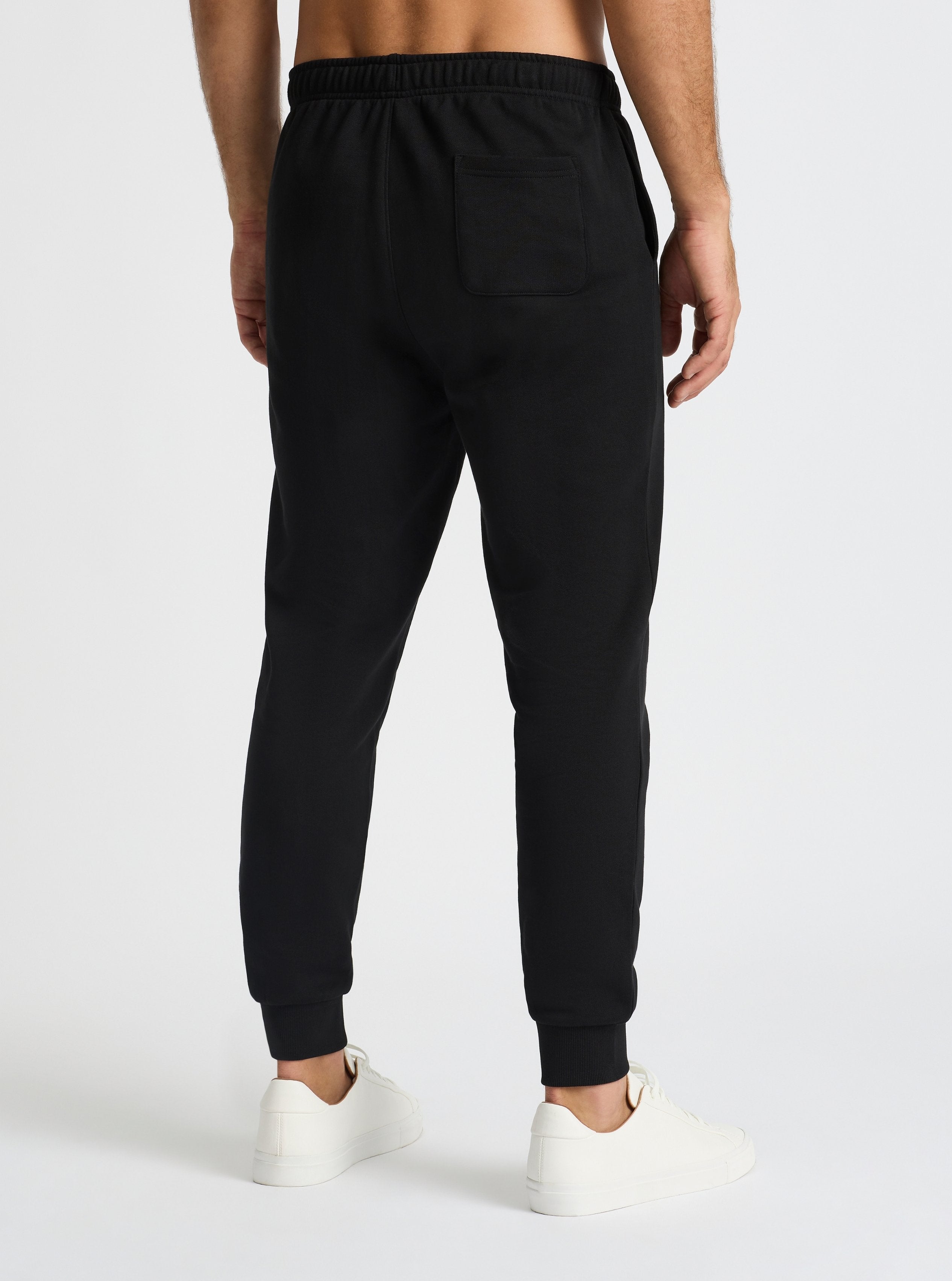 Black|Good Earth Cotton® Sweatpants for men – Sustainable Cotton Sweatpants|Jack is 6’2” and wearing a size L